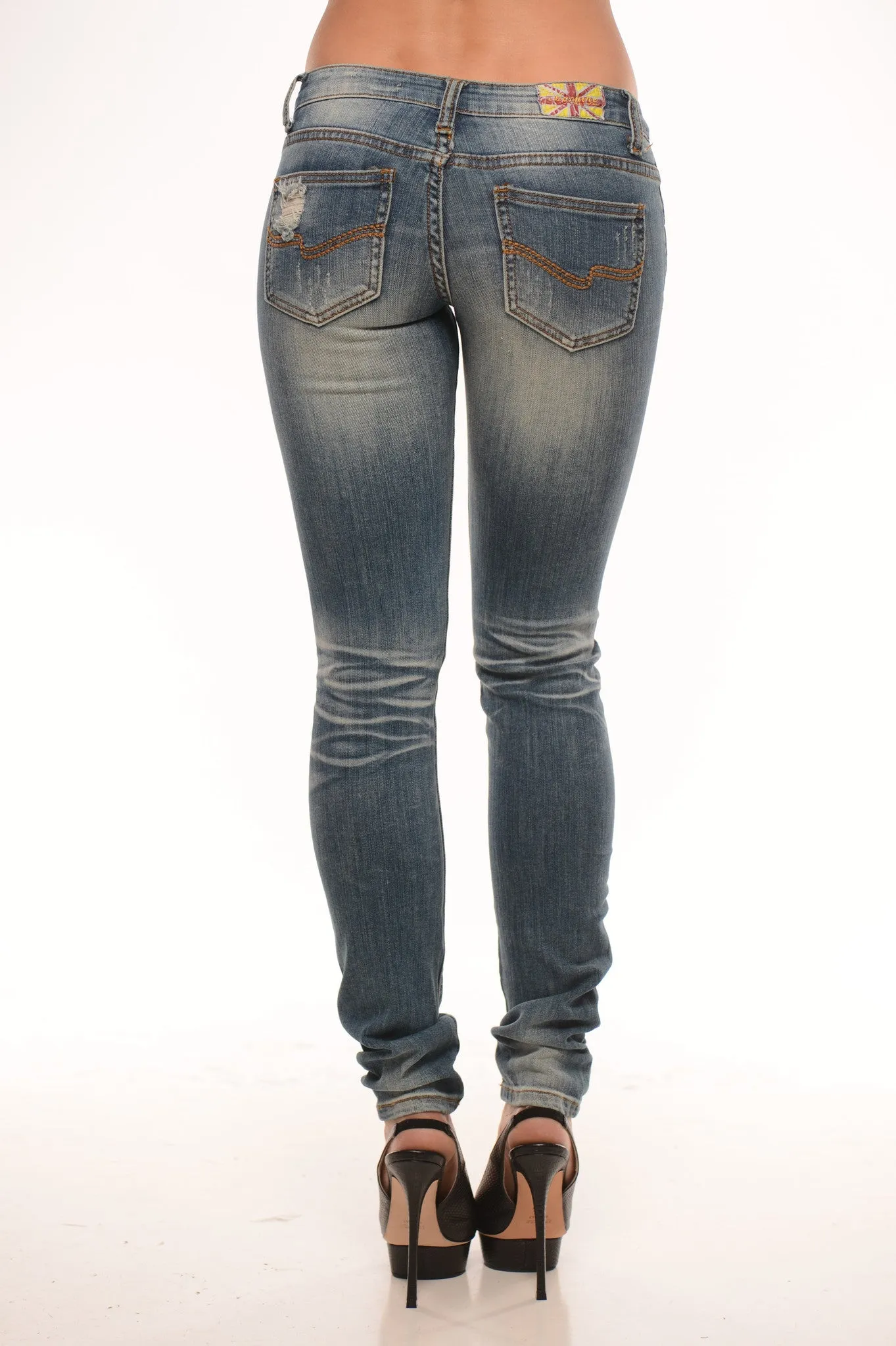 Low Rise Medium Wash Distressed Thigh Super Skinny Jeans